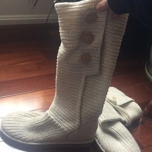 Cream knit with gold metallic accent thread UGGs.